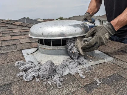Cleaning Dryer Vent On Roof in Clinton